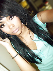 Neat mulatto cutie posing in hot pictures