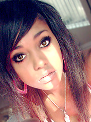 Neat mulatto cutie posing in hot pictures