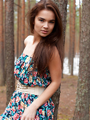 Lachia overwhelming youthful beauty and carefree allure creates a stunning visual treat among the towering pine trees.