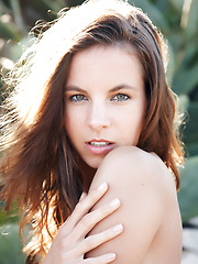 Exotic brunette Altea show off her firm ass and petite breasts in this desert shoot.