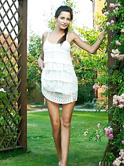 Sexy brunette in the garden