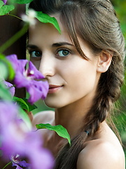 Sexy brunette in the garden