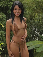 Carolina Lopez is a petite hot latina teen that stripped off her bikini and got nude for the first time on the net