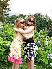 Gorgeous Japanese girls expose their breasts