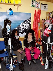 Blindfolded beauty touching her friends damp clits indoors