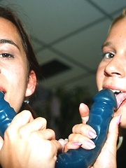 Two sexy lesbian teenage girls caressing teenage coochies
