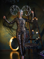 This flawless babe puts on a costume so she can express herself as she takes every part of it off.
