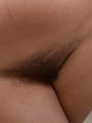 Hairy babe Felicia gets bored while doing laundry